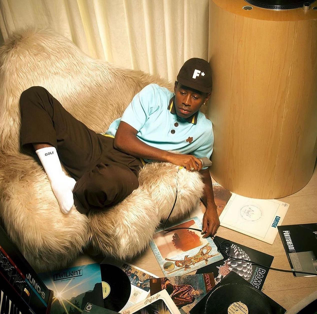 Somewhere I Would Like To Live - #feliciathegoat lounging on a “yeti” rocking chair by #marioscheinc